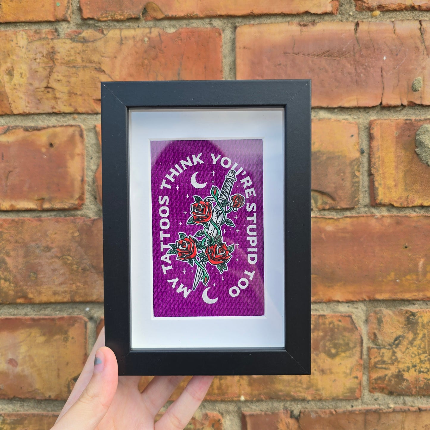 Stupid Tattoos (Purple) Framed Decor